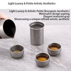 Titanium-plated stainless steel portable travel tea set, including teapot and double-walled tea cups, lightweight outdoor campi